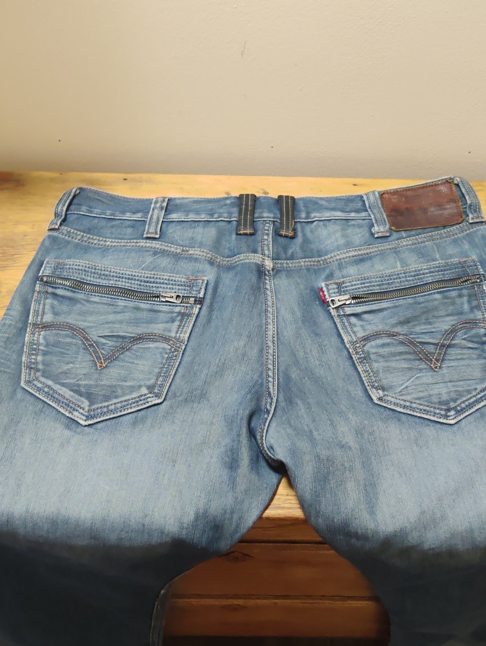 Levi's Light Blue Washed Straight Jeans with Zip Back Pockets